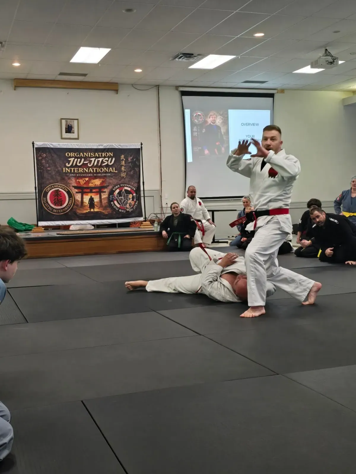 An instructor demonstrates a technique at an OJI seminar